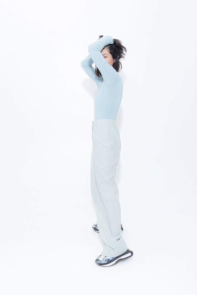 Grey wide trousers with loose tucks