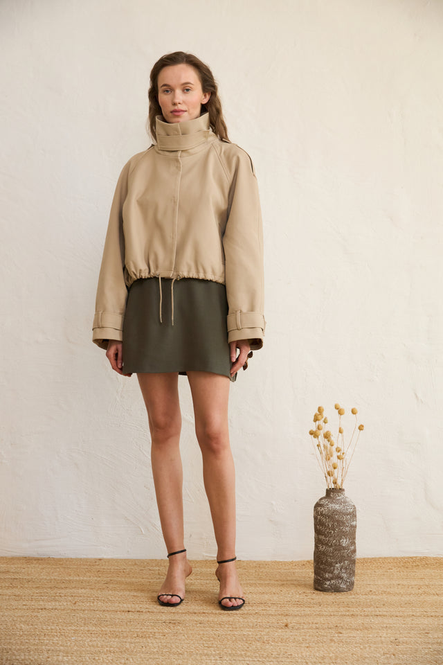 Cotton Bomber Jacket is the perfect blend of functional design and effortless style. Crafted from breathable 100% cotton, it features a structured high collar that adds a modern edge while providing extra coverage on windy days. The adjustable drawcords at the hips allow you to customize the fit—wear it cinched for a more defined silhouette or relaxed for a casual, laid-back vibe.