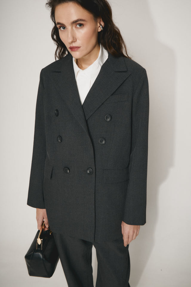 Oversized double-breasted jacket. Made of luxury deadstock fabric