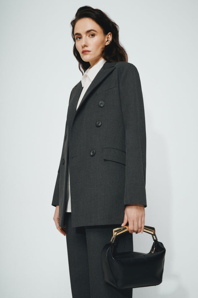 Oversized double-breasted jacket. Made of luxury deadstock fabric