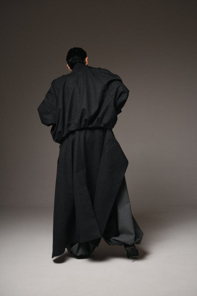 This Transformable Wool Bomber-Coat redefines versatility with modern tailoring and modular design.