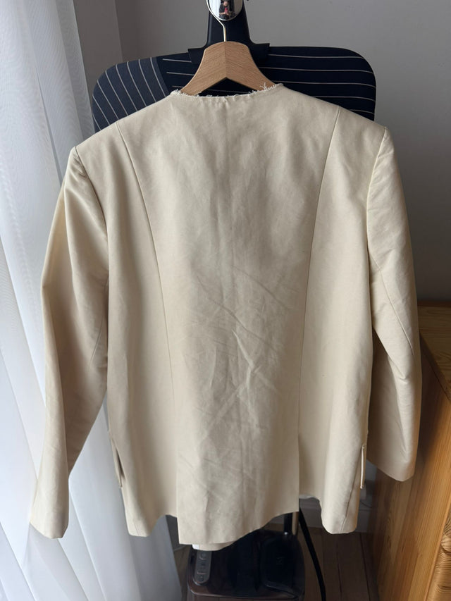 Item 1. Ivory jacket - Used