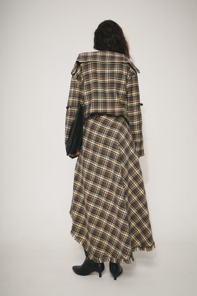 The woolen & cotton tartan maxi skirt has a belt. Made of deadstock luxury fabrics