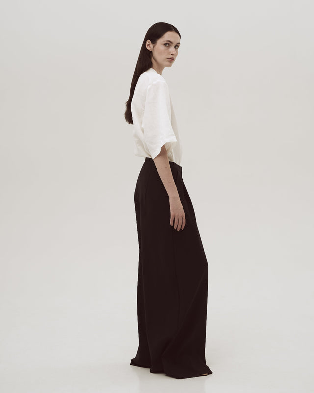 Woolen wide palazzo trousers with pockets. 