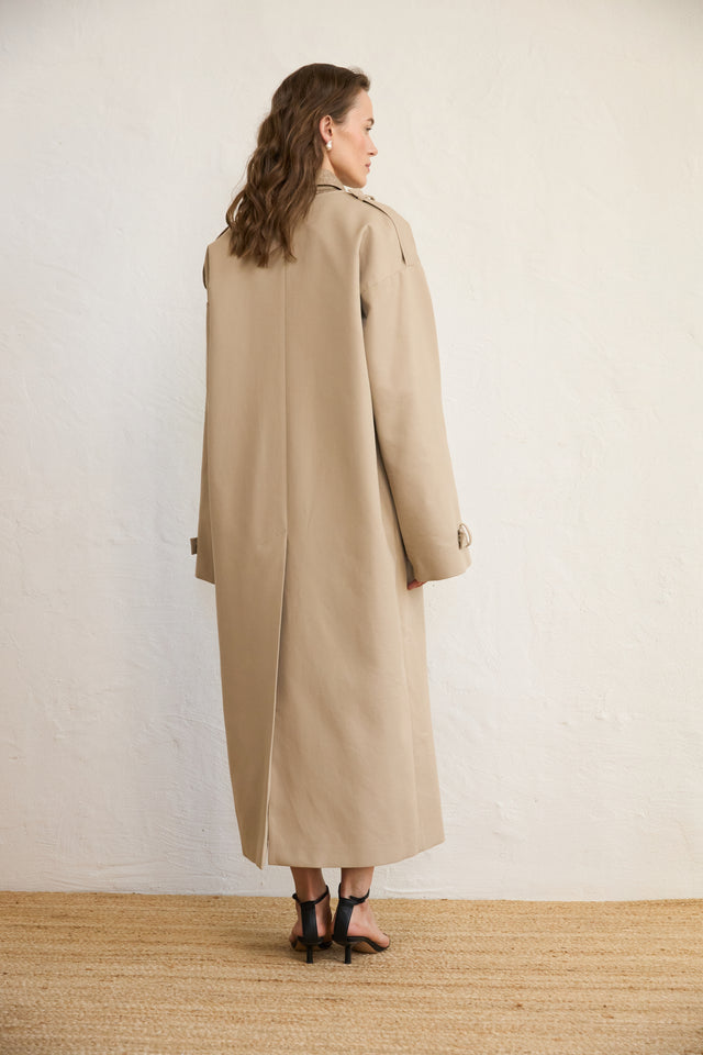  a beige kimono-style trench coat 