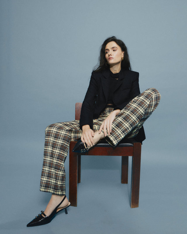 The woolen & cotton tartan trousers with zippers. Made of deadstock luxury fabrics